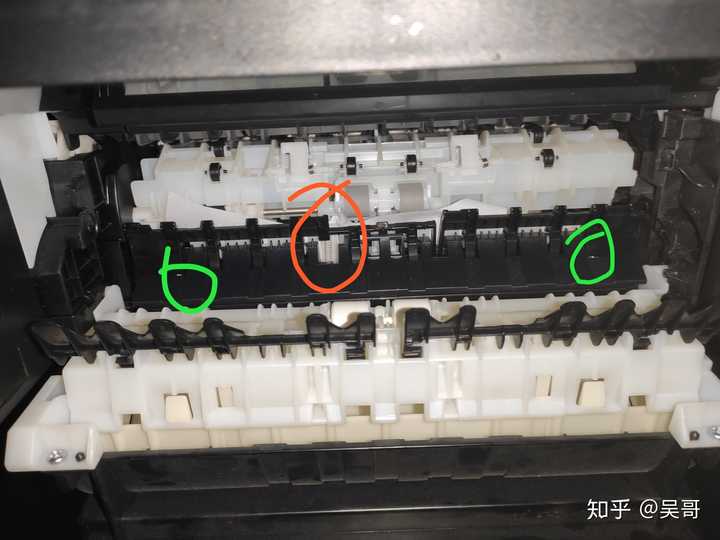 老铁们有谁知道佳能打印机里这个连着弹簧的柱子怎么修,进纸的时候竖