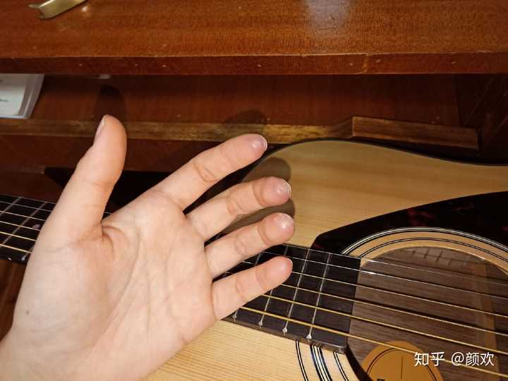 弹吉他手疼怎么解决?