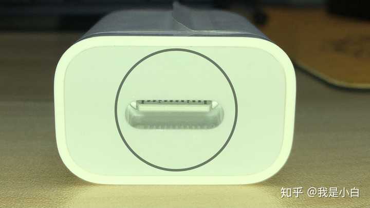 请问这个苹果充电头是原装的吗,充电线接口处有点缝隙