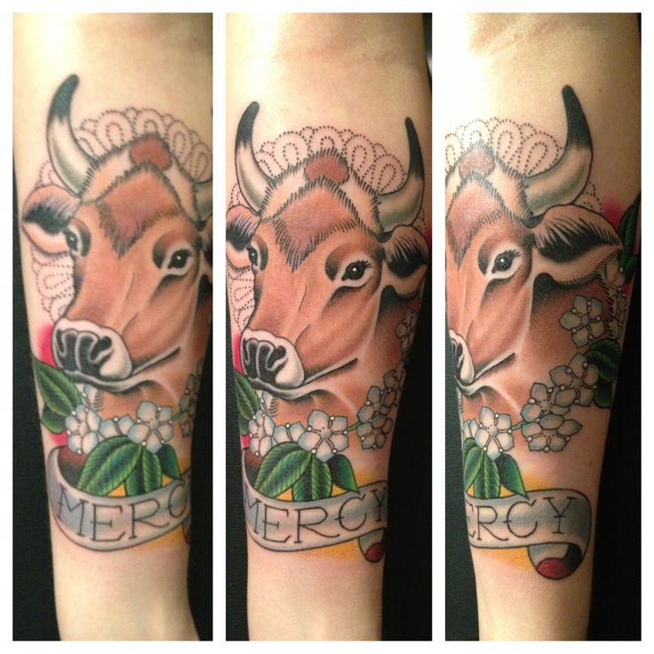 想纹个纹身鄙人属牛而且是金牛座所以想纹个牛头的图案谁有好看一点的