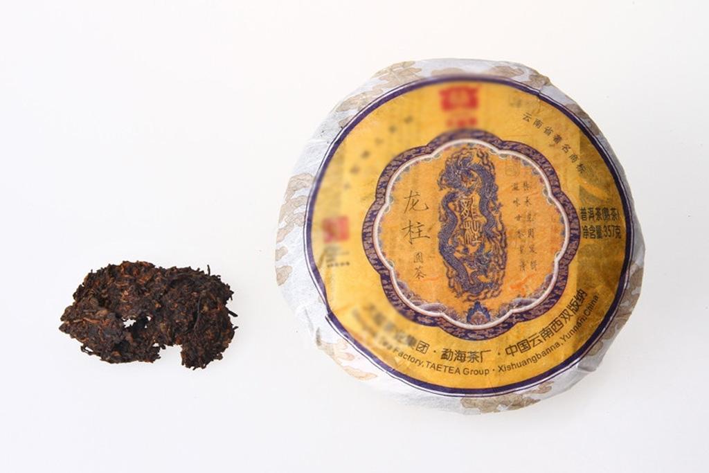 大益皇茶级精品2012年龙柱圆茶熟饼开汤