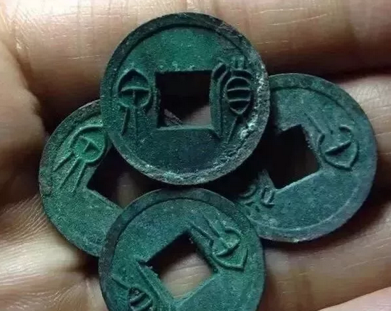 从古钱币形状看为人处世之道
