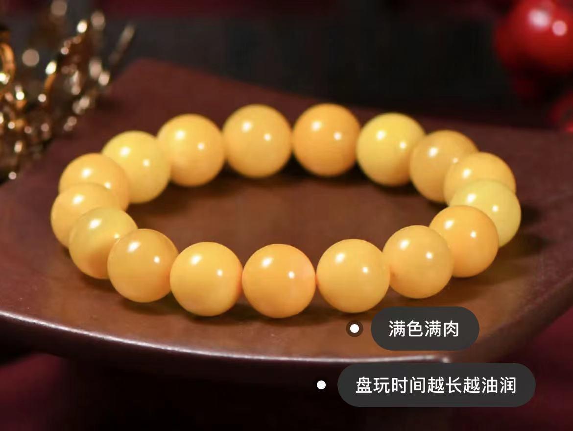 蜜蜡紫光灯照射一条流淌纹呈紫色是不是吃药了