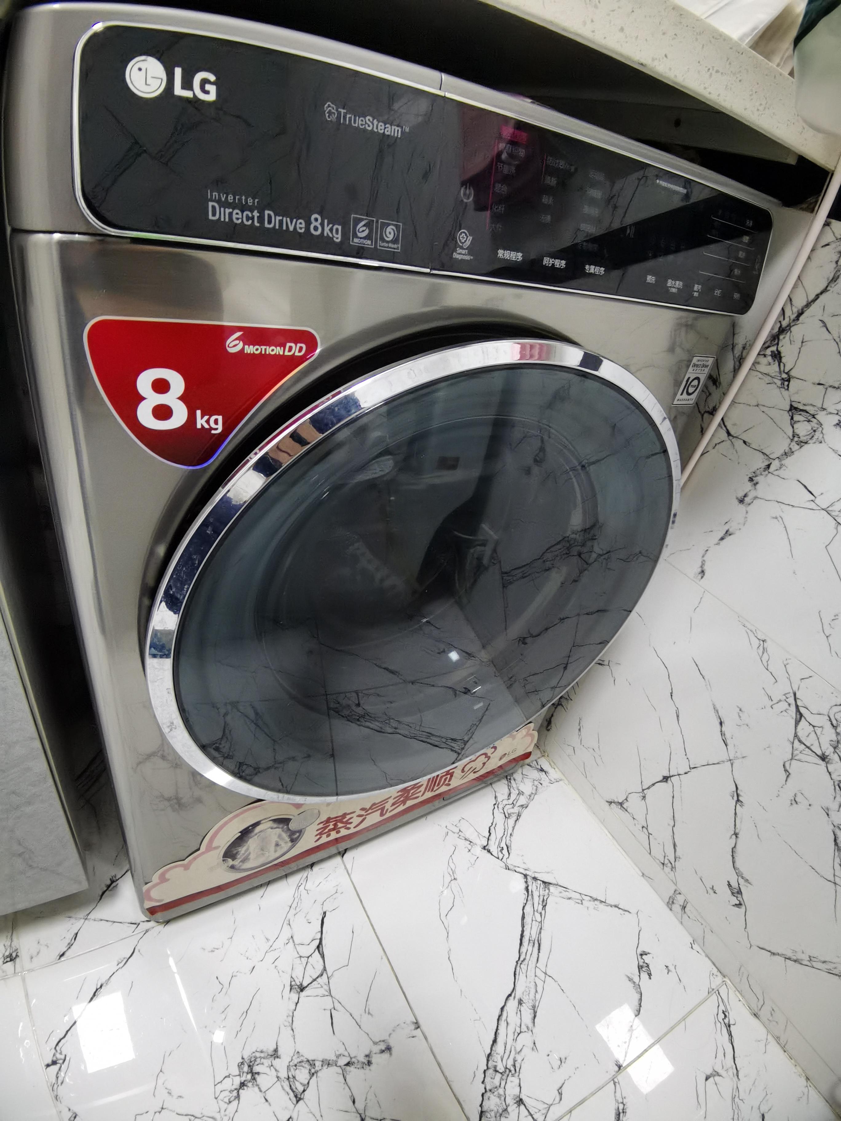 滚筒一般都是保用十年的dd直驱电机洗烘一体公斤数小点是8kg但是洗衣