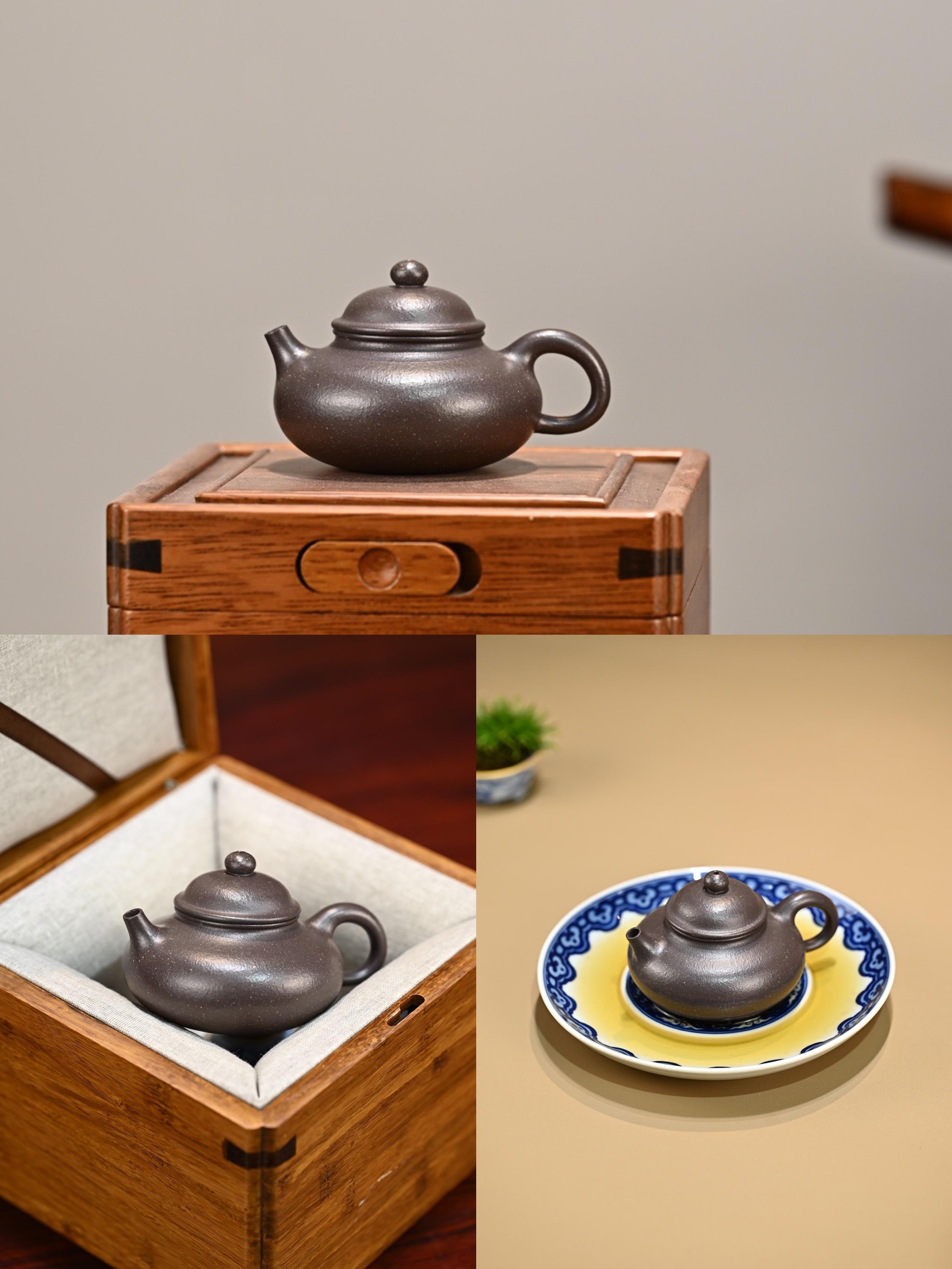 紫砂器型容天壶容天壶取材于佛教文化有大度能容之意用之养气明心见性