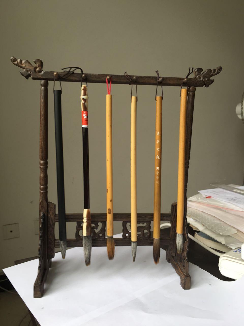 如何处理洗毛笔后水池变黑的问题