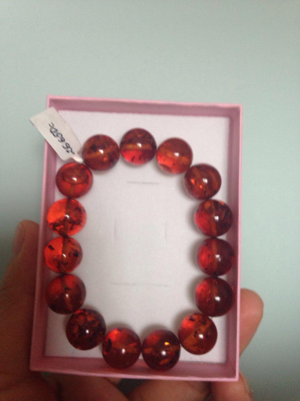 褐色琥珀蜜蜡,从国外买回来的,到底是真是假?还有这个到底属于什么?