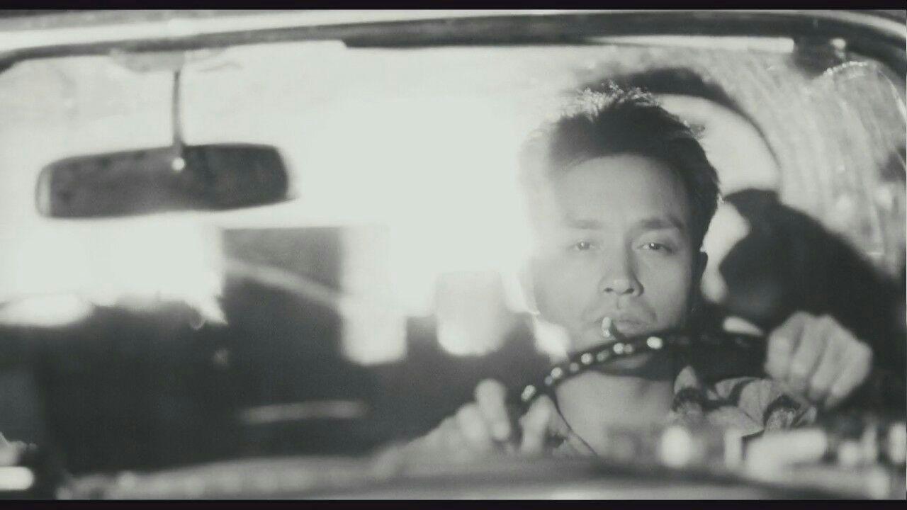 有张国荣开车吸烟的照片吗镜头在正前方表情很惆怅