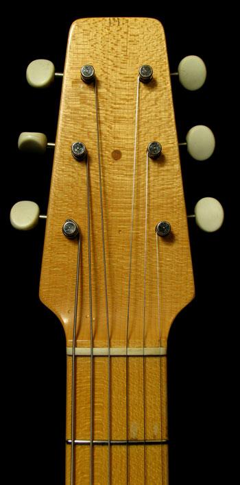 为什么gibson的les paul,sg等电吉他琴头设计有仰角?