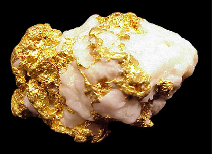 岩金里的金子因为各种原因(主要是地下含金热液)与围岩生长在一起,由