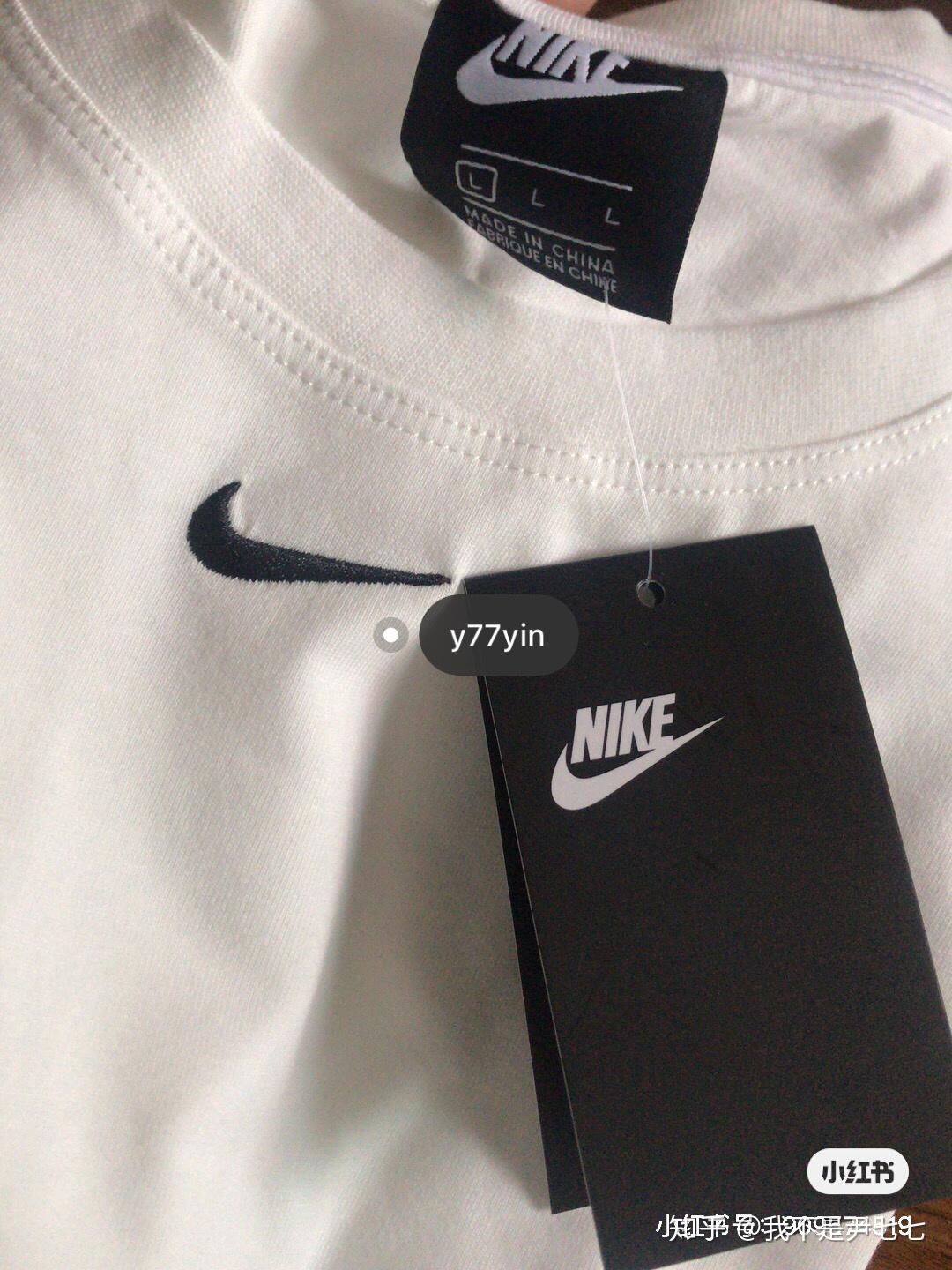 我想知道nike白色的t恤纯白的只有胸前有一个很小小的勾的logo棉的是