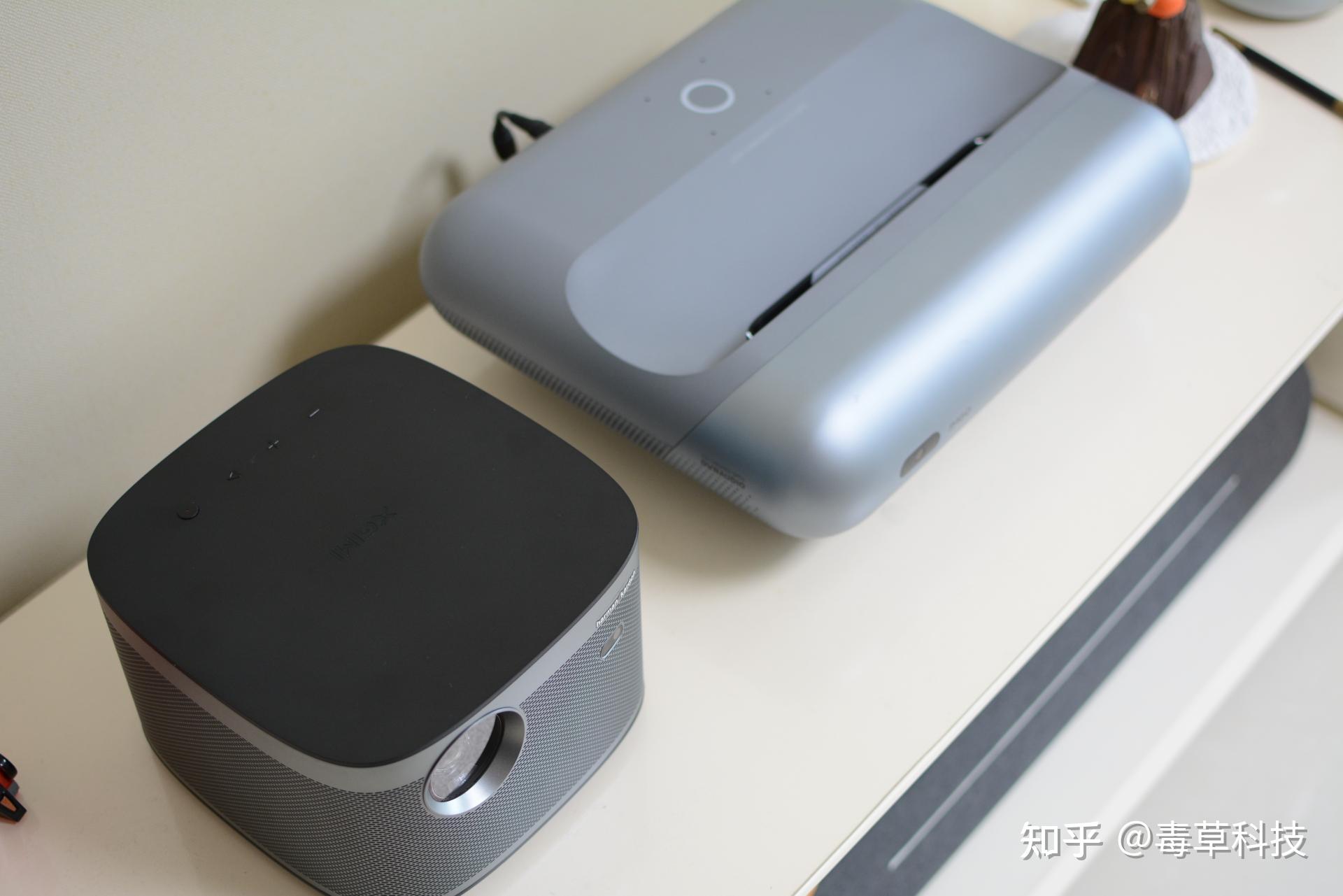 家用投影怎么选长焦还是短焦极米h3s对比坚果智慧墙o1pro横评