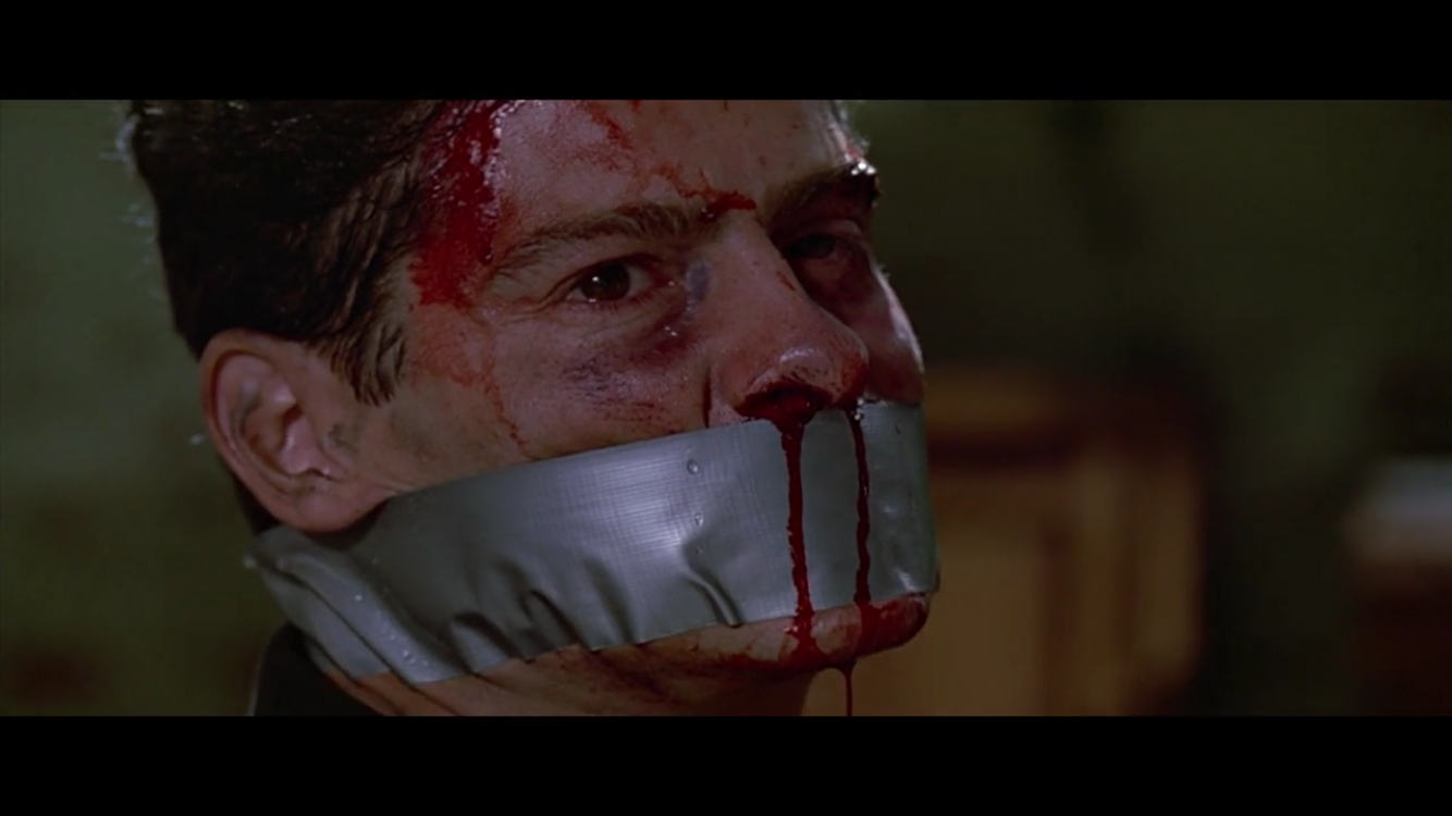 有哪些具体的镜头体现出了昆汀的暴力美学?