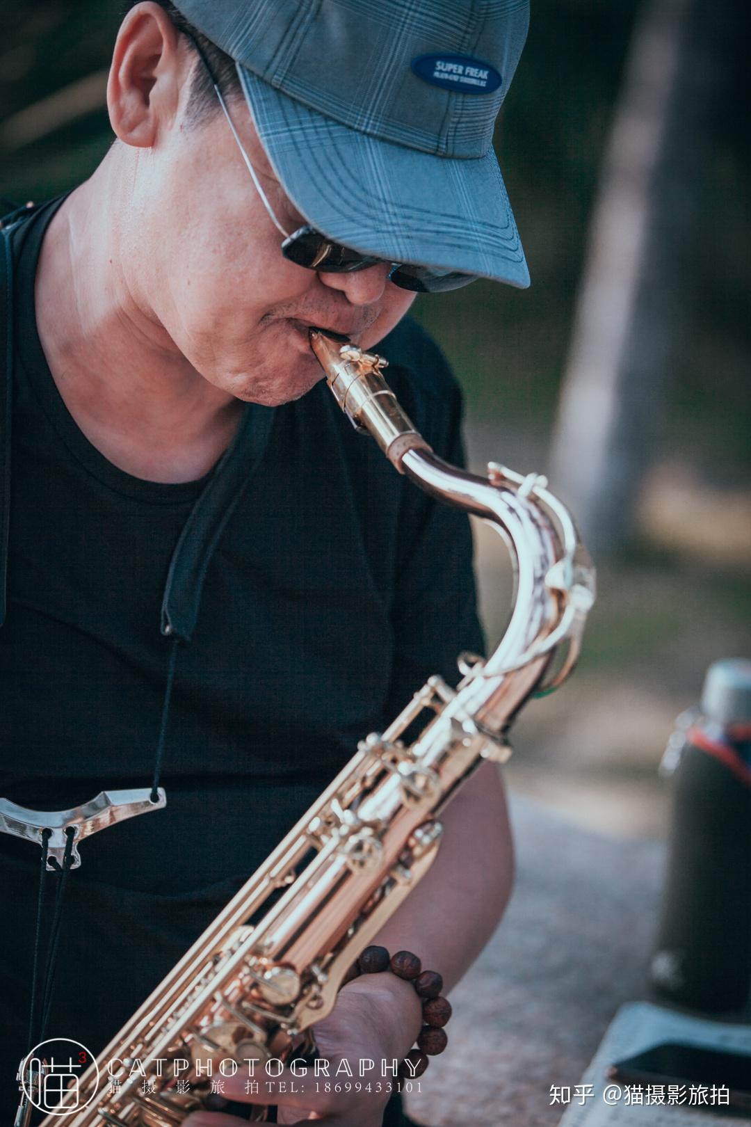 猫摄影┨三亚湾椰梦长廊吹号人