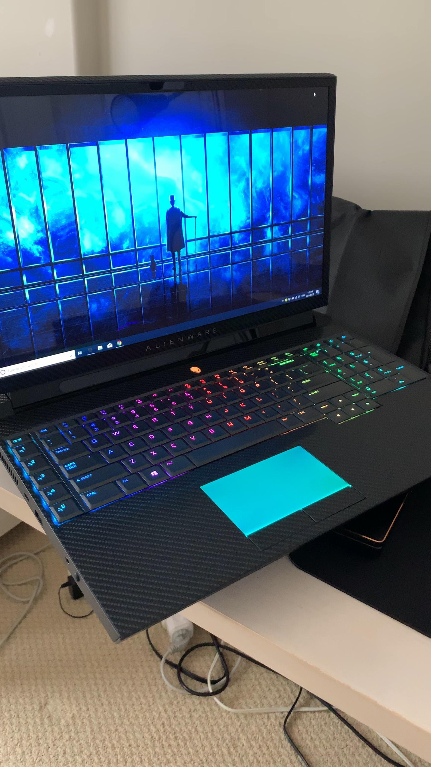 选外星人a51m还是刚出的苹果八核macbook pro?