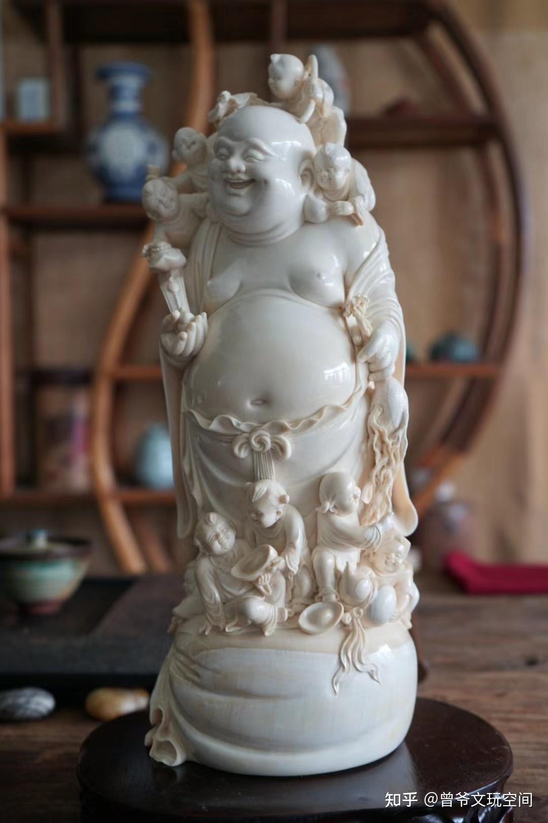 10年文玩人曾爷聊聊猛犸牙雕九子弥勒佛的作品心得