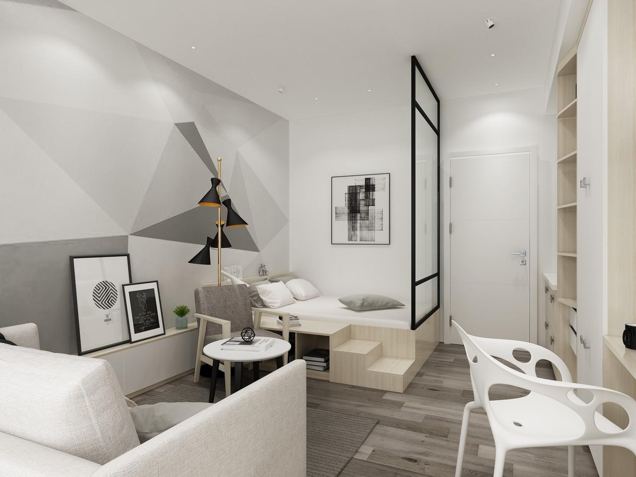 这是一套面积为43㎡的单身公寓,户型是长方形的两室,进门的一室分割成