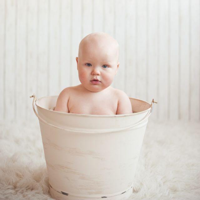 Bathing My Newborn Baby / Bathing A Newborn Baby Stock Image C037 6748 Science Photo Library : Stick to bathing your infant every other day or so to avoid drying out their skin, but keep wiping their face, neck, and diaper area throughout the day.3 x research source.