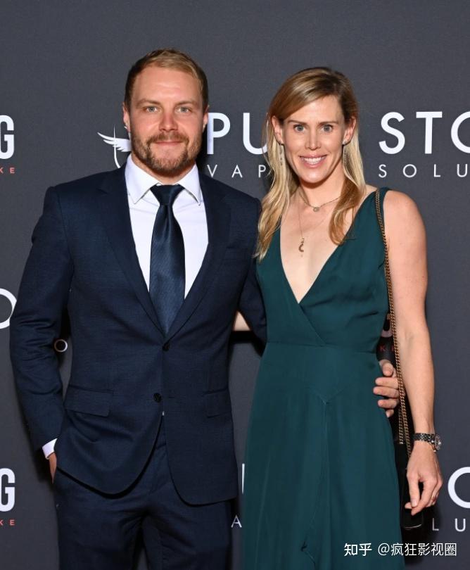 10,阿尔法罗密欧竞速f1车队的基米·莱科宁(kimi raikkonen)他的妻子