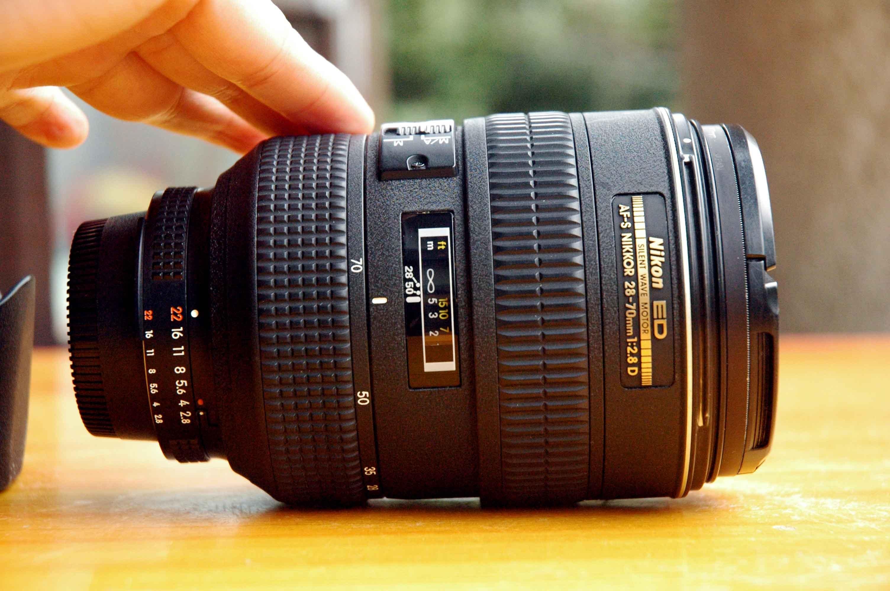 尼康d610配一个2000以内的镜头,已有小钢炮,不需要太广的镜头,配什么