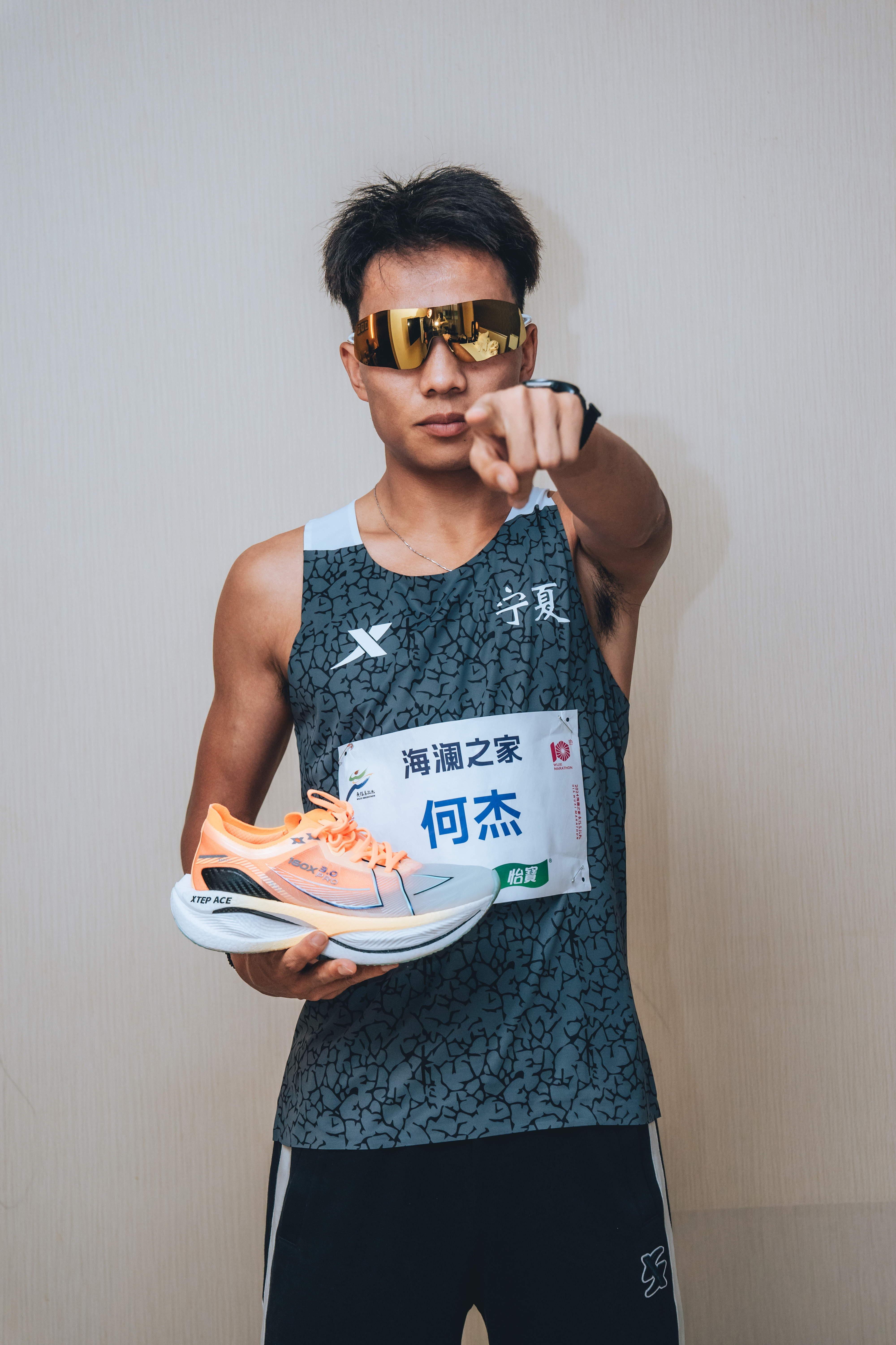 2024无锡马拉松何杰打破全国男子马拉松纪录中国马拉松进入206时代