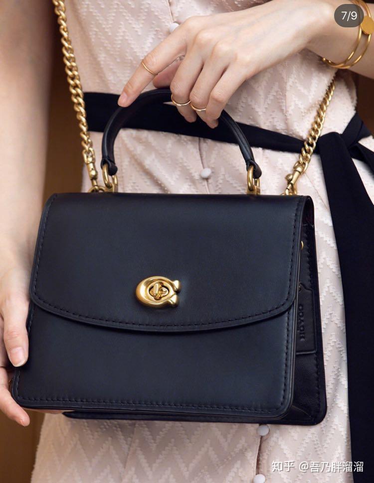 金诚皮具走在夏天里轻熟又浪漫的蔻驰parker复古翻盖手提包