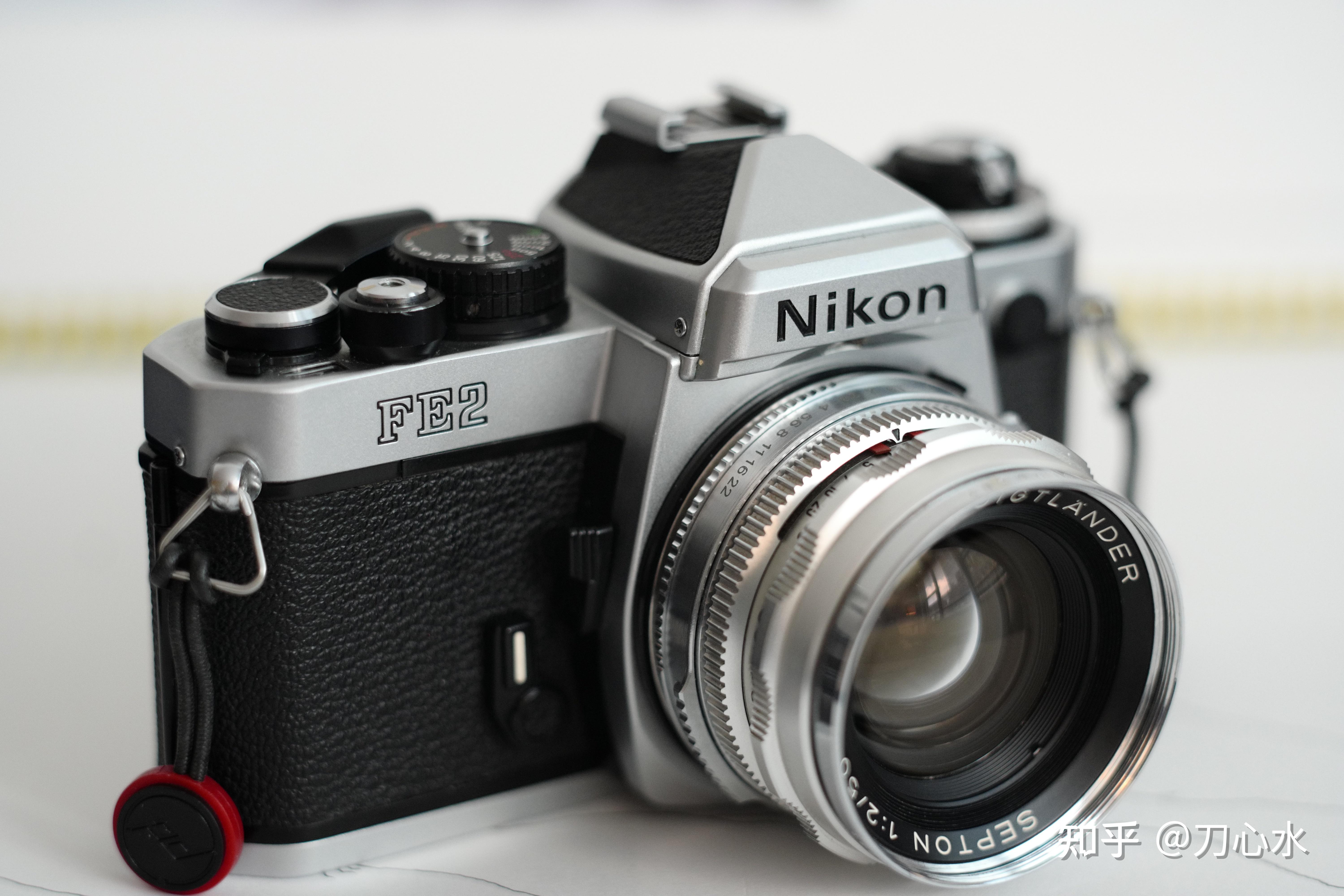 尼康胶片机fe2应该配什么镜头