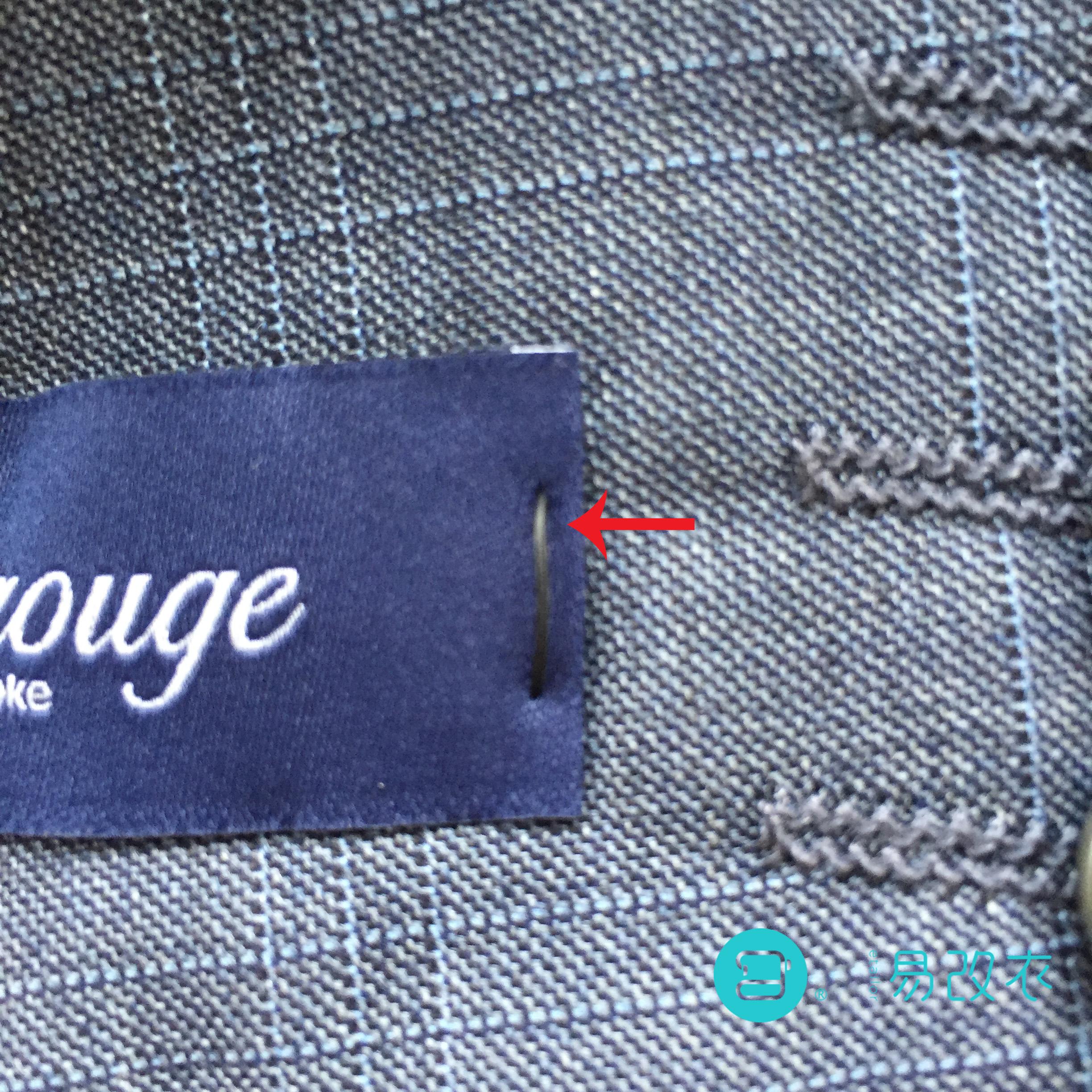 为什么西装袖子上有个商标