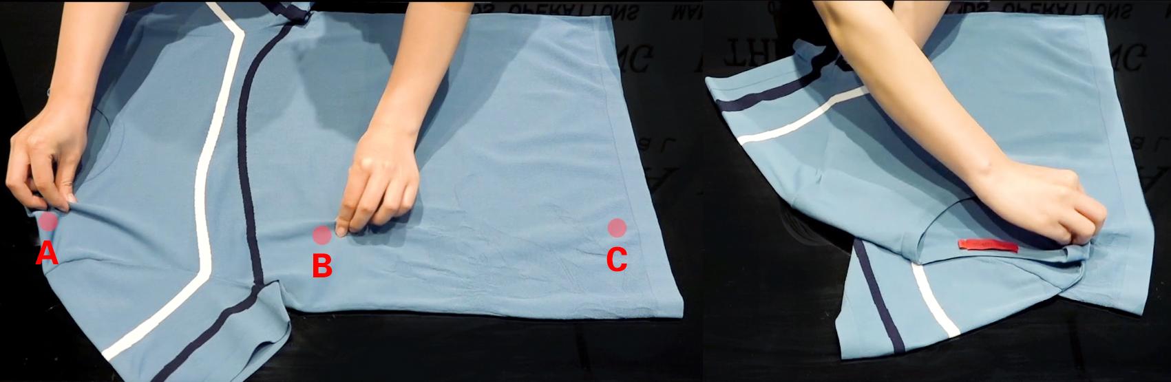 将另一部分衣服折叠下去,放下即可完成方法二:第1步:将t恤背面朝