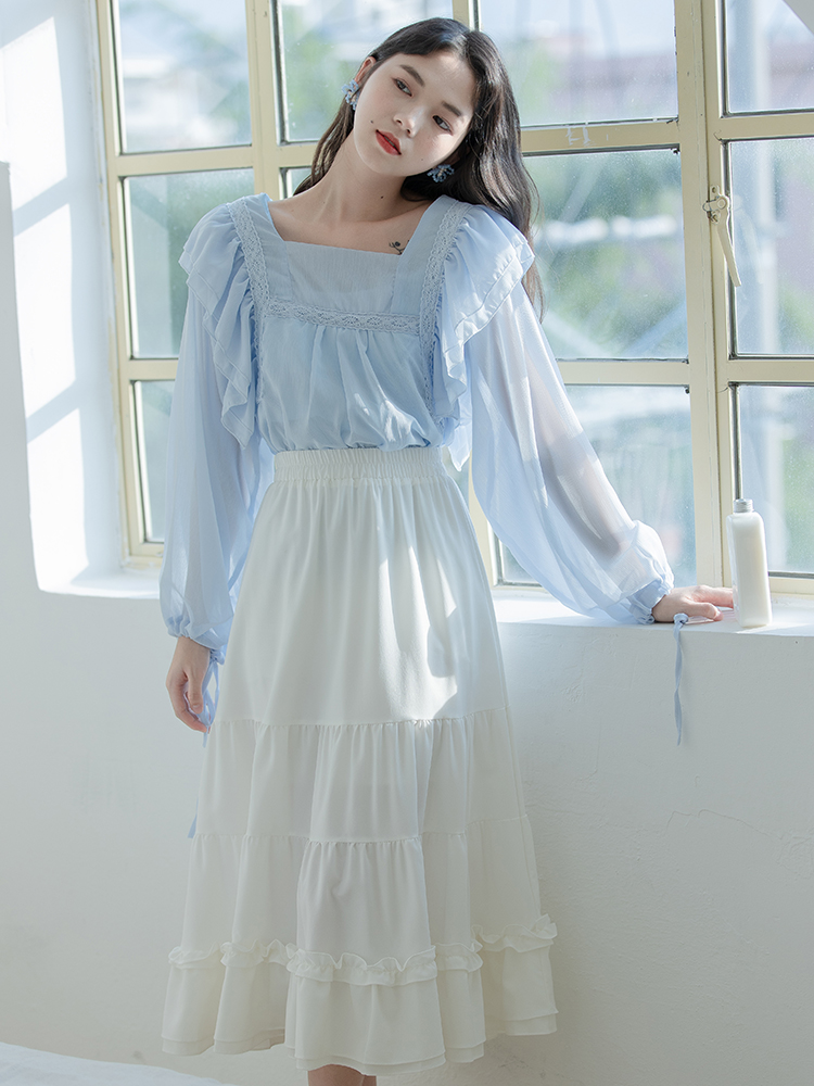 白色半身裙应该搭配什么上衣