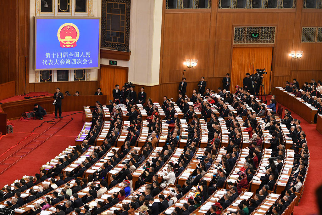 政府工作报告提出，要推动两岸关系和平发展、推进祖国统一大业，释放了哪些信号？