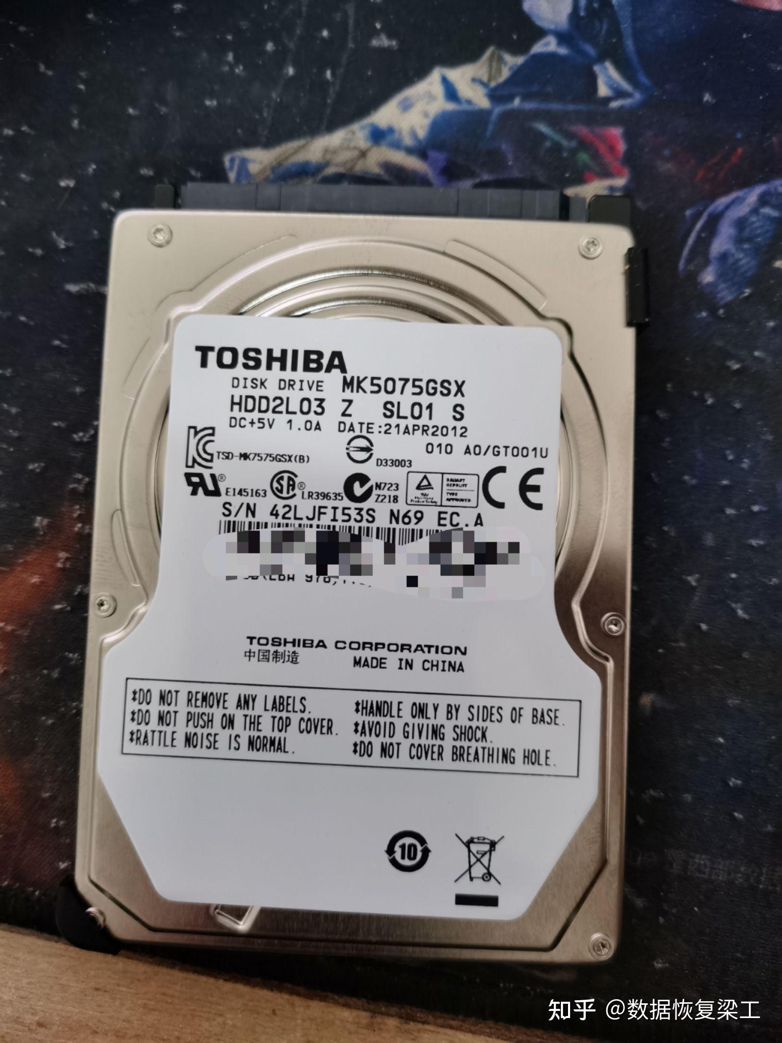 四川客户东芝500g移动硬盘,通电咔咔异响.