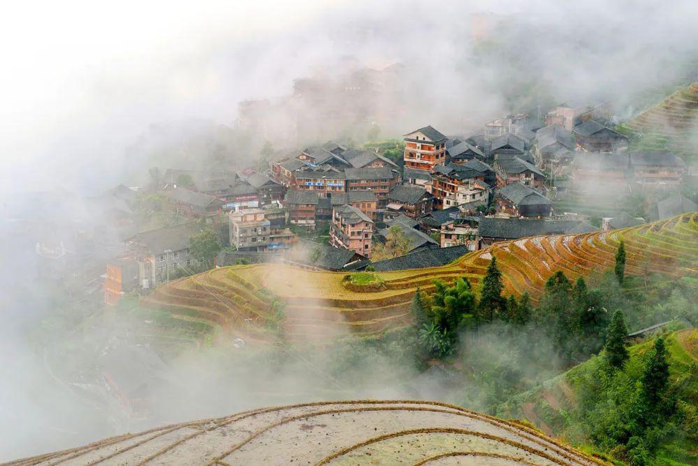 广西田心村龙脊梯田漓江渔火晚霞撒网桂林山水塔山摄影