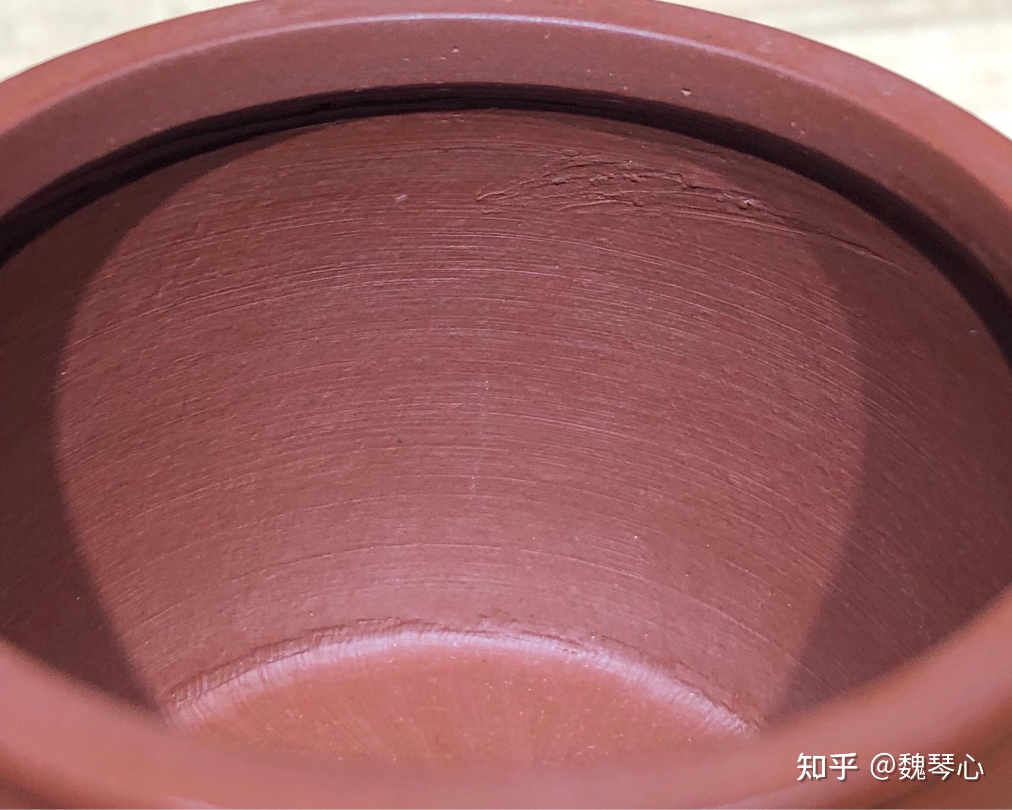 请大家看看这紫砂壶里的横向条纹,说是全手工制作应该不会有吧?