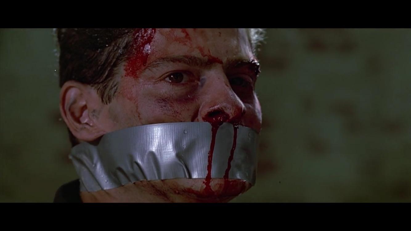 有哪些具体的镜头体现出了昆汀的暴力美学?