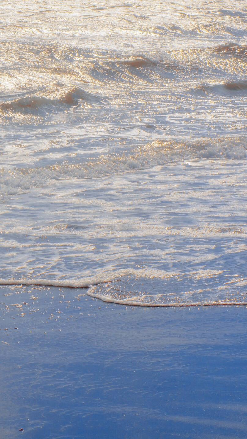 有哪些好看的黄昏下海边的背景图?