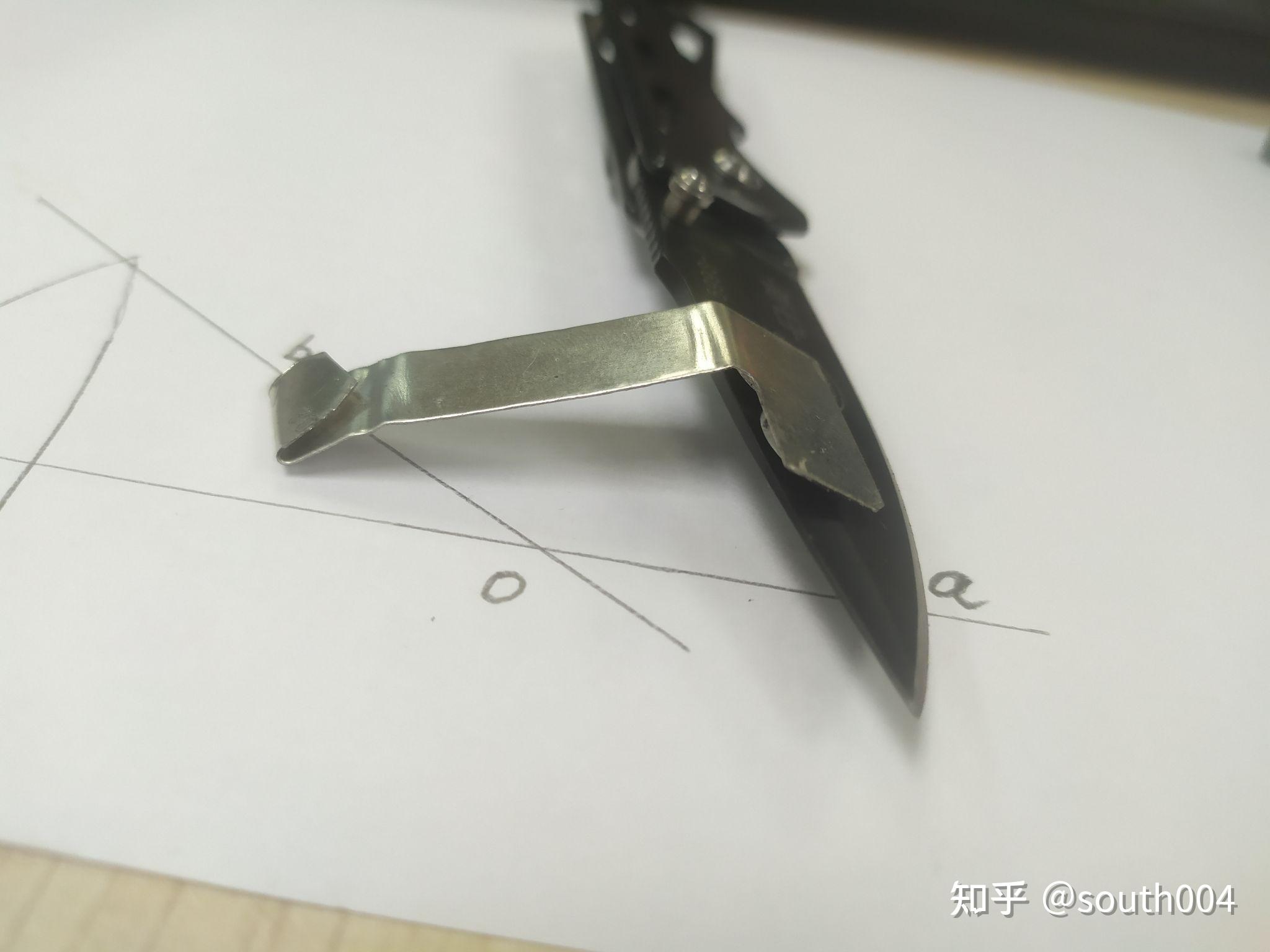 使用004定角器磨弧形刀刃