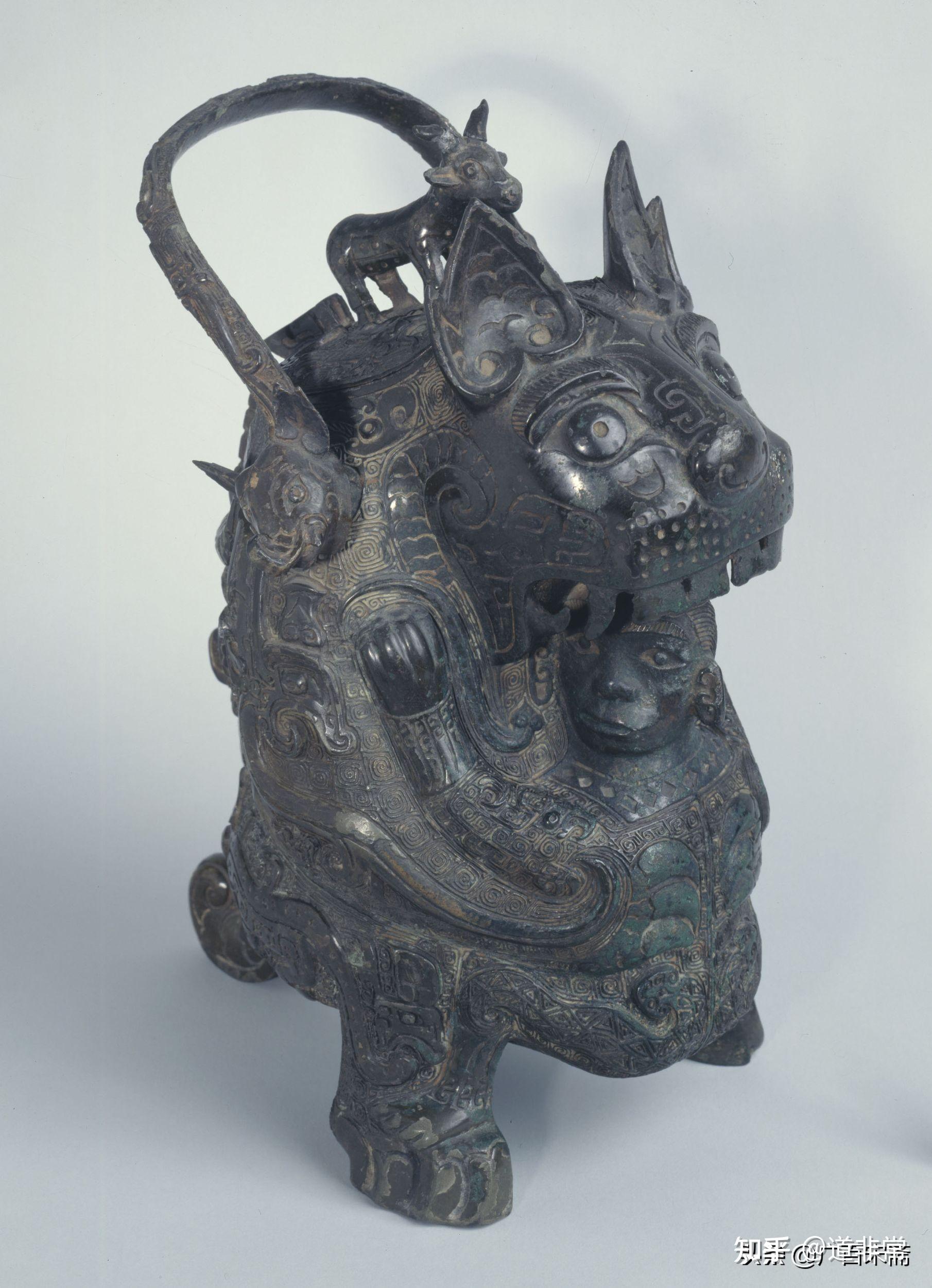 古埃及重要文物猴妈怀抱猴娃形状的雪花石花瓶跟湖南宁乡出土的青铜器