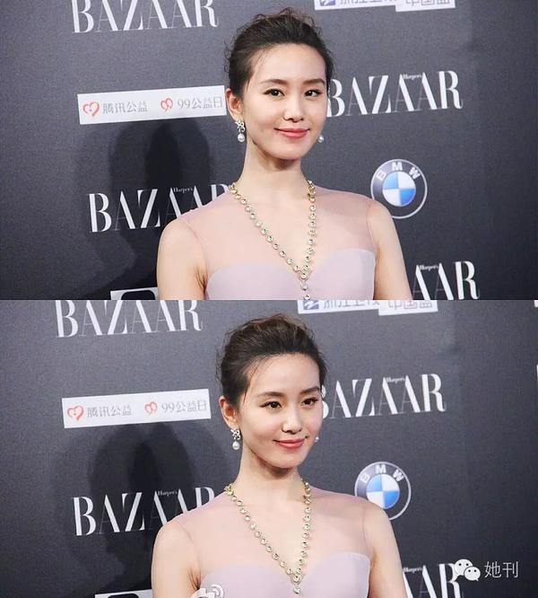 颈部肌肤细滑有致,更映出女人的肤白貌美