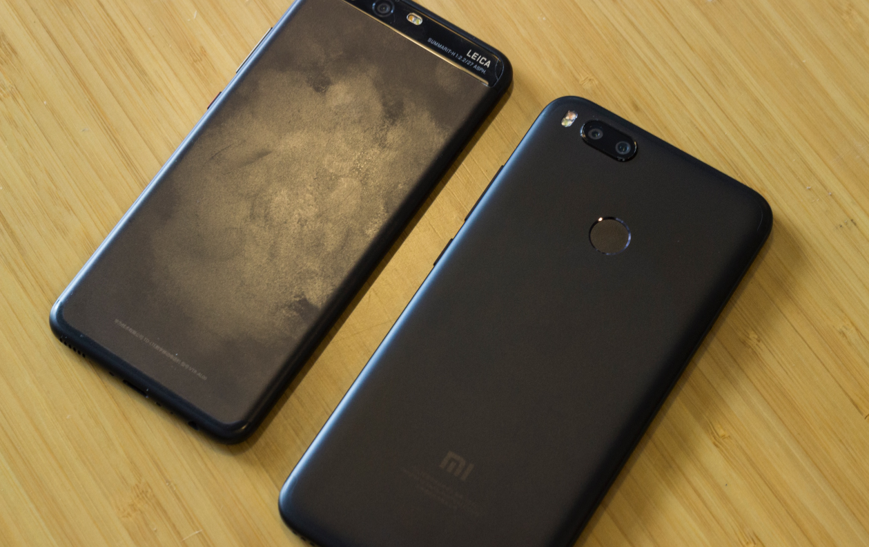 黑色好看太粘指纹?这可能是国内首款背面有防