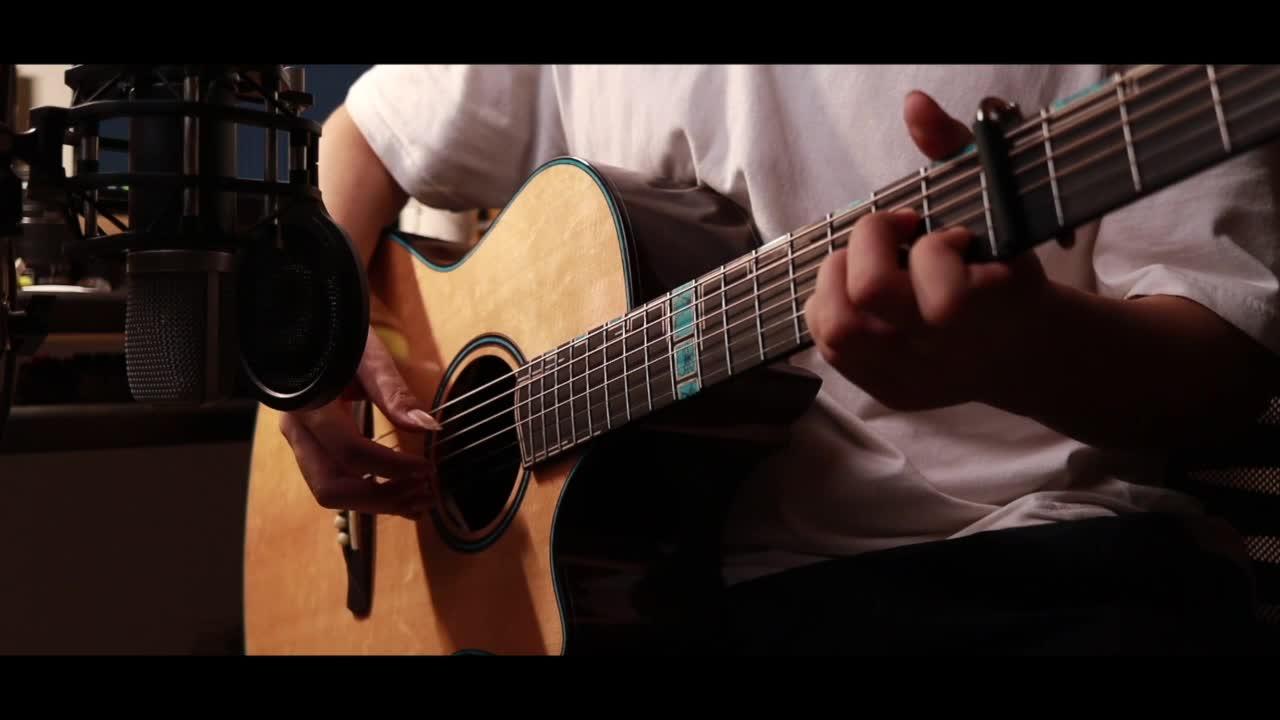 39寸红松玫瑰木缺角面单刘吉祥吉他