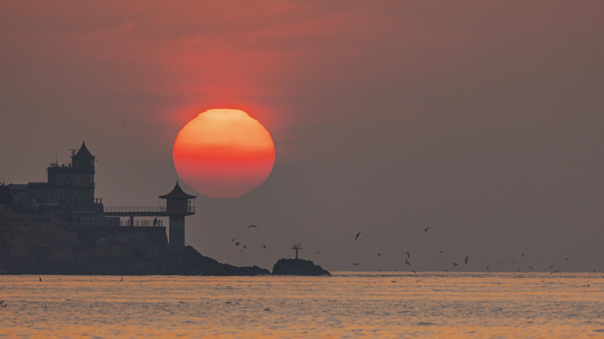 在青岛的海边想要看到最完美的日出,一般几点合适? - 知乎
