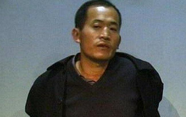 被抓获后的杨新海 被抓获后的杨新海
