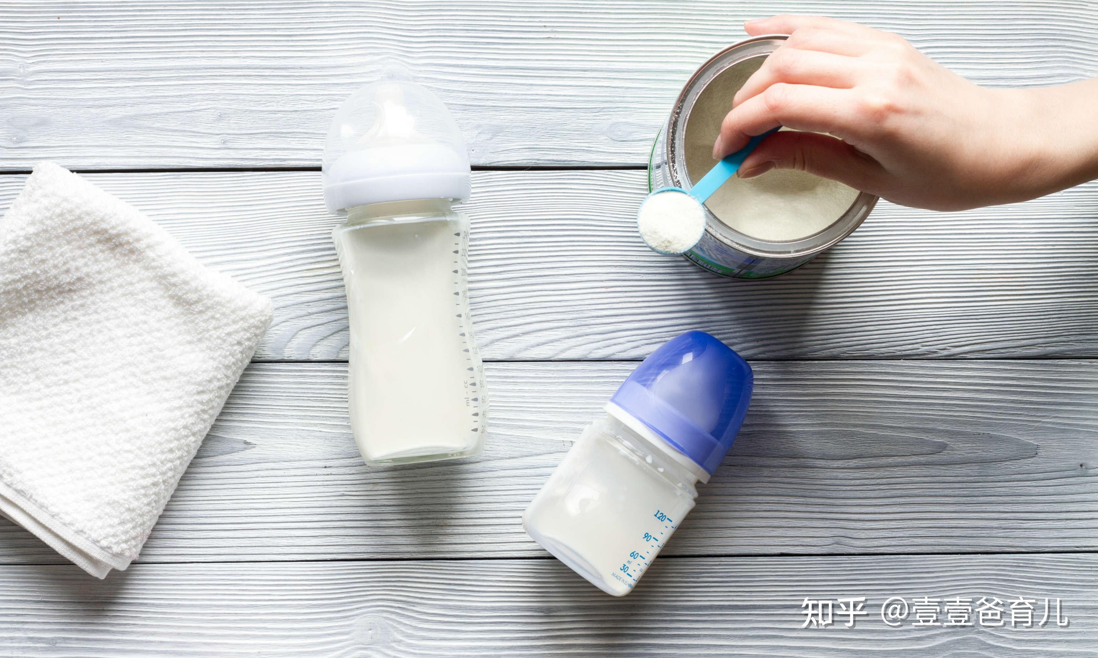 Portrait of mother bottle-feeding baby at home — female, milk - Stock ...