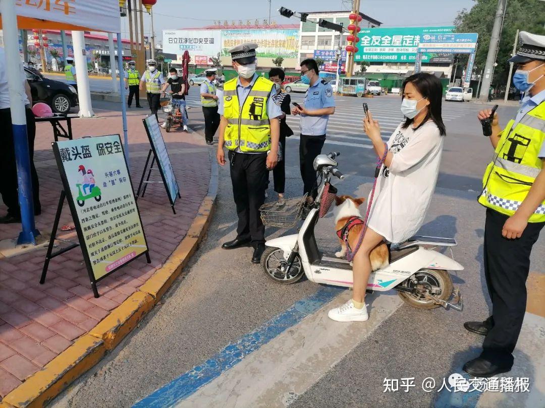 魏縣騎電動車不戴頭盔發朋友圈集10贊才放行