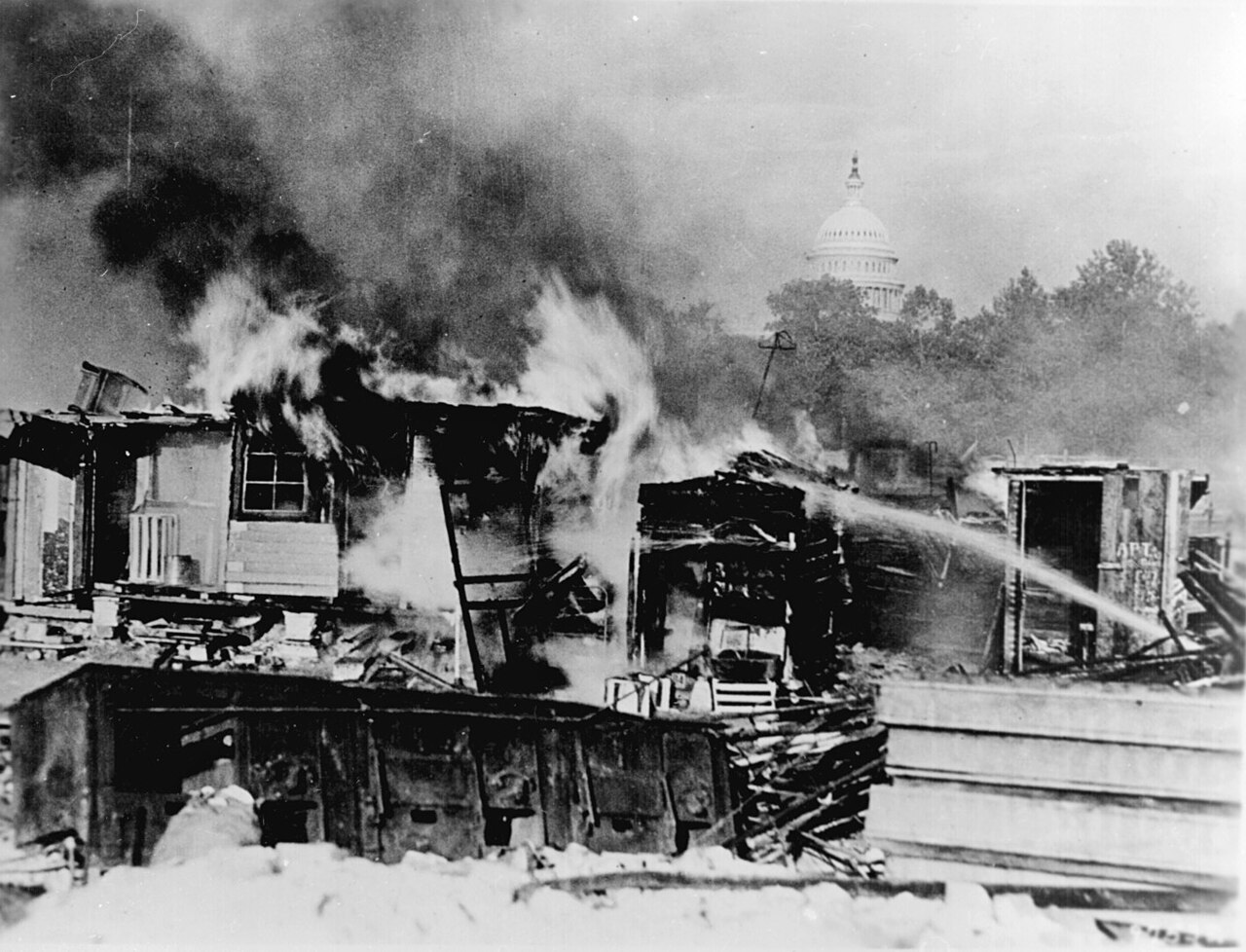 Shacks erected by the Bonus Army on the Anacostia flats burning after being set on fire by the US military (1932)