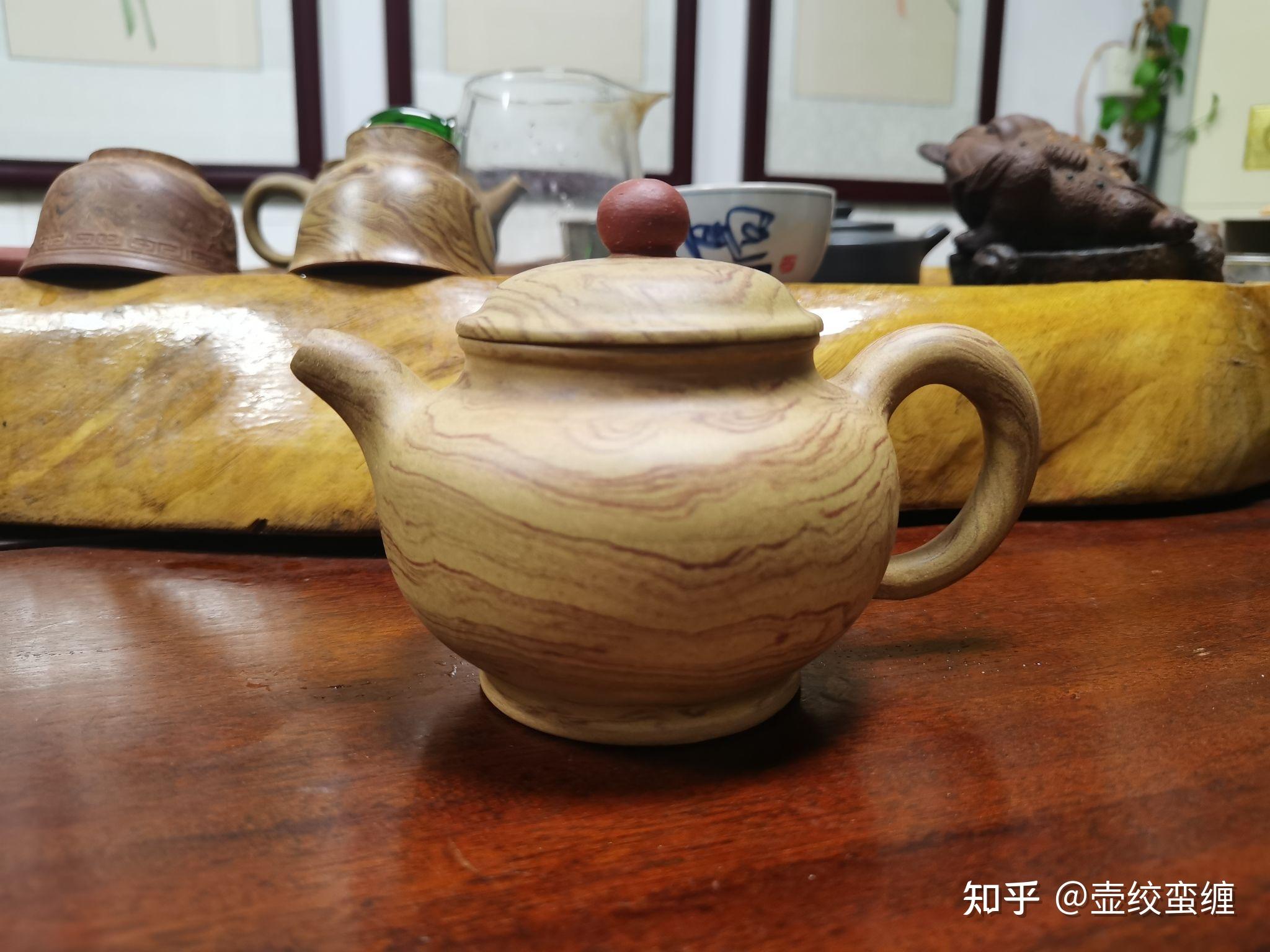 掇只绞泥紫砂壶