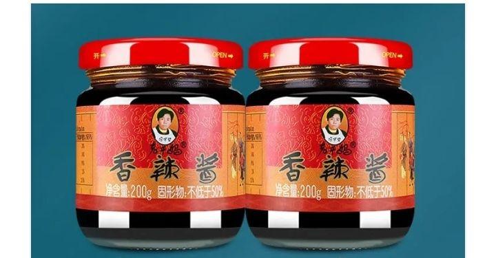 老干妈换logo换包装了乐见潮玩陶华碧