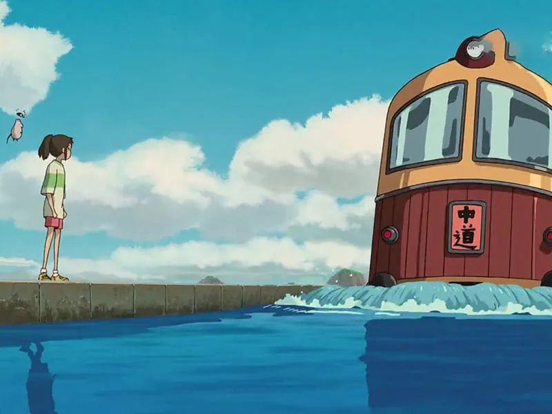 《千与千寻》里那辆不知通往何方,在如明镜般水面划过的神秘电车,还是