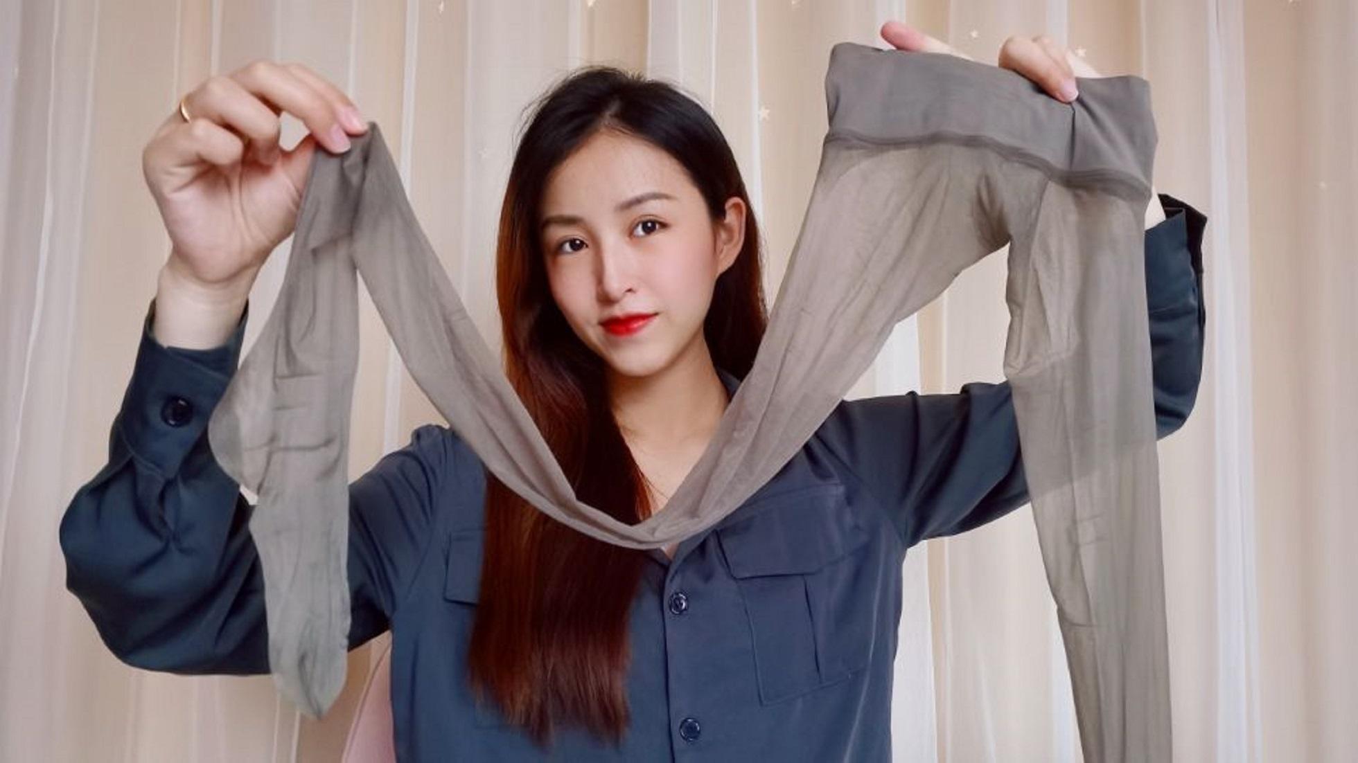 妹子是丝袜控试穿一款灰色油光亮丝穿上后果然与众不同